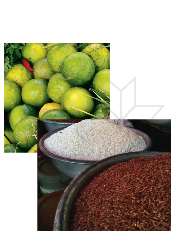 A bowl of rice next to a bowl of limes and a bowl of red rice.