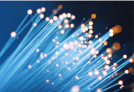 Servers in a data center with blue lights and cables.