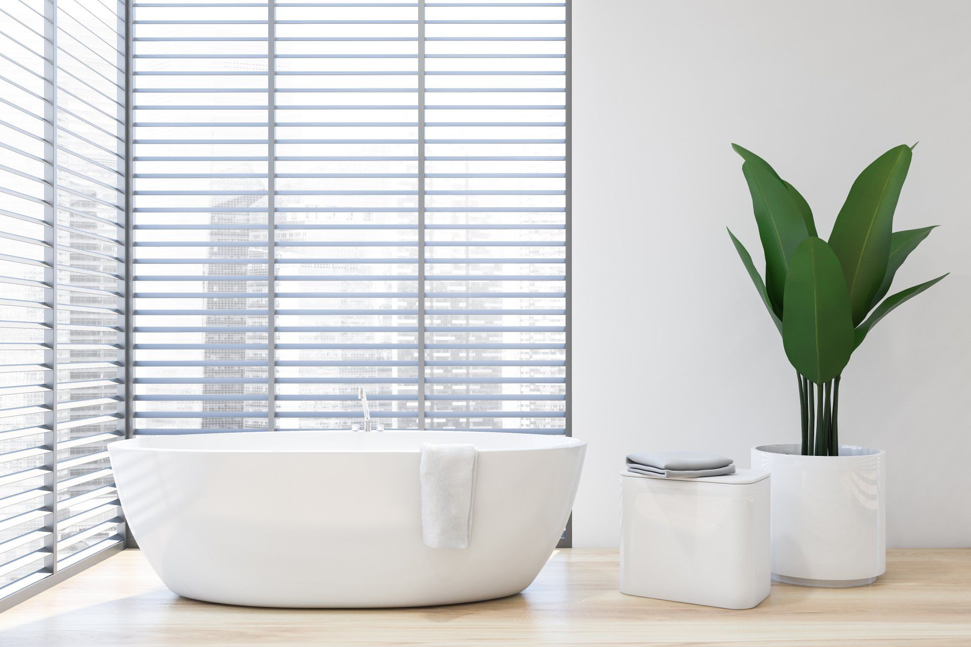a bathroom with a bathtub and a plant in front of a window with blinds Simply Windows.
