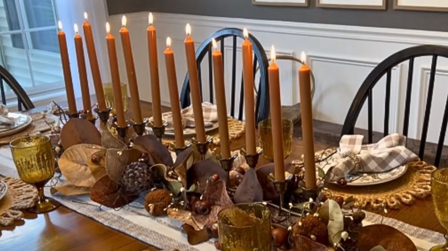 a dining room table with a bunch of candles on it Simply Windows.