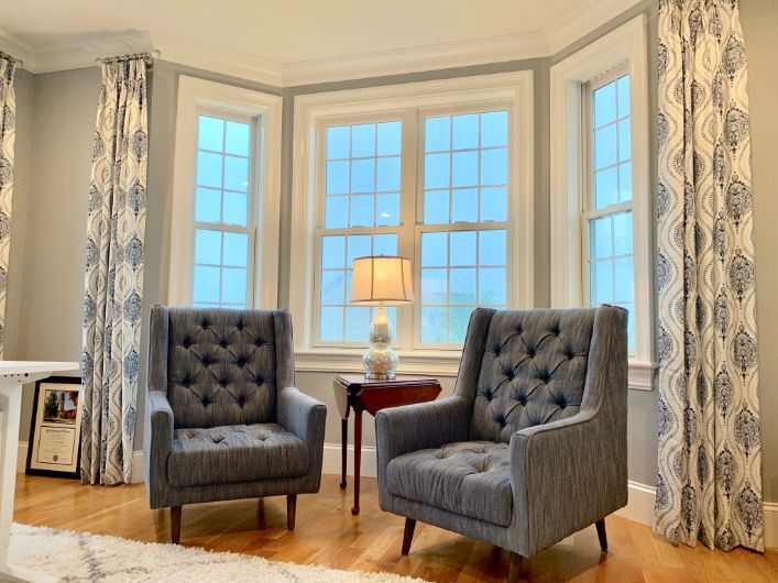 Use Window Treatments to Spotlight Your Bay Windows: Living Room