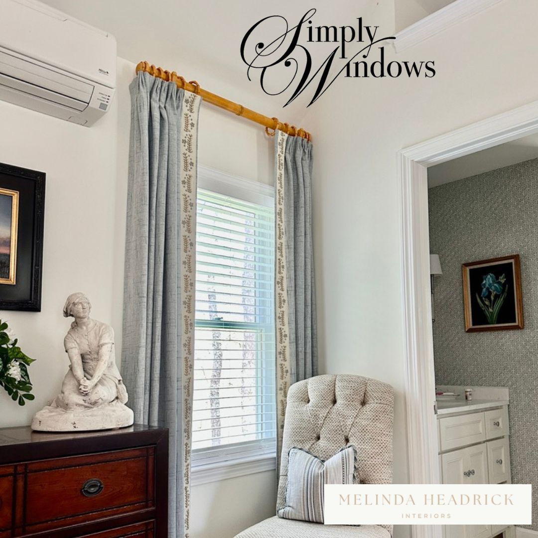 A bedroom corner with chair has elegant drapery and hardware - simply windows, ma