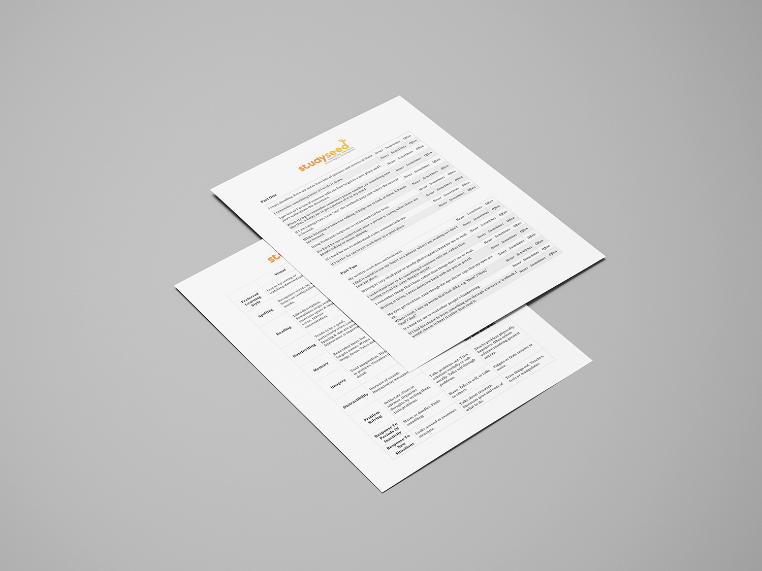 Two white documents on a gray surface, one overlapping the other, with text.