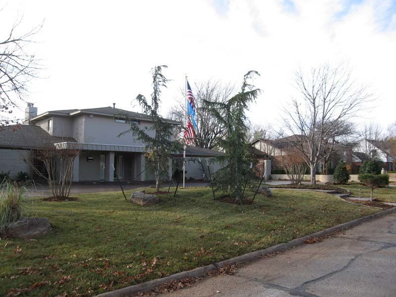 A house with an american flag in front of it