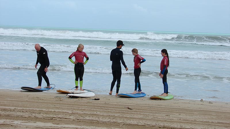 friends strolling by the beach