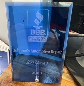 Blue glass award for Johnson's Automotive Repair, 10 years accredited business in 2020. |  Johnson's Automotive