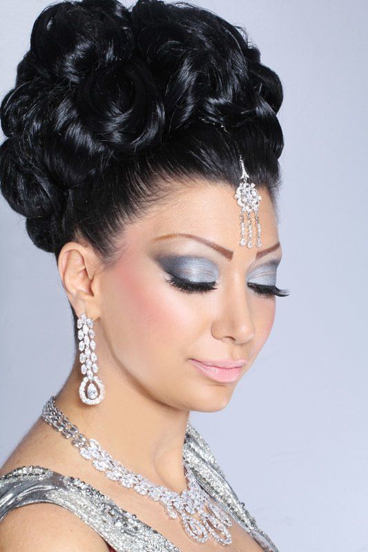 Indian Woman Posing with Her Eyes Close — in Glendale, CA — AML Academy Makeup & Hair