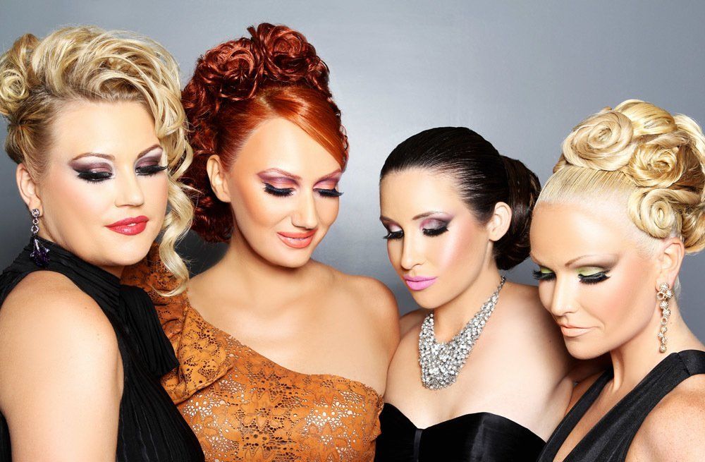Four Women Looking Down — in Glendale, CA — AML Academy Makeup & Hair