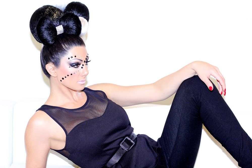 Woman Sitting Down Posing — in Glendale, CA — AML Academy Makeup & Hair
