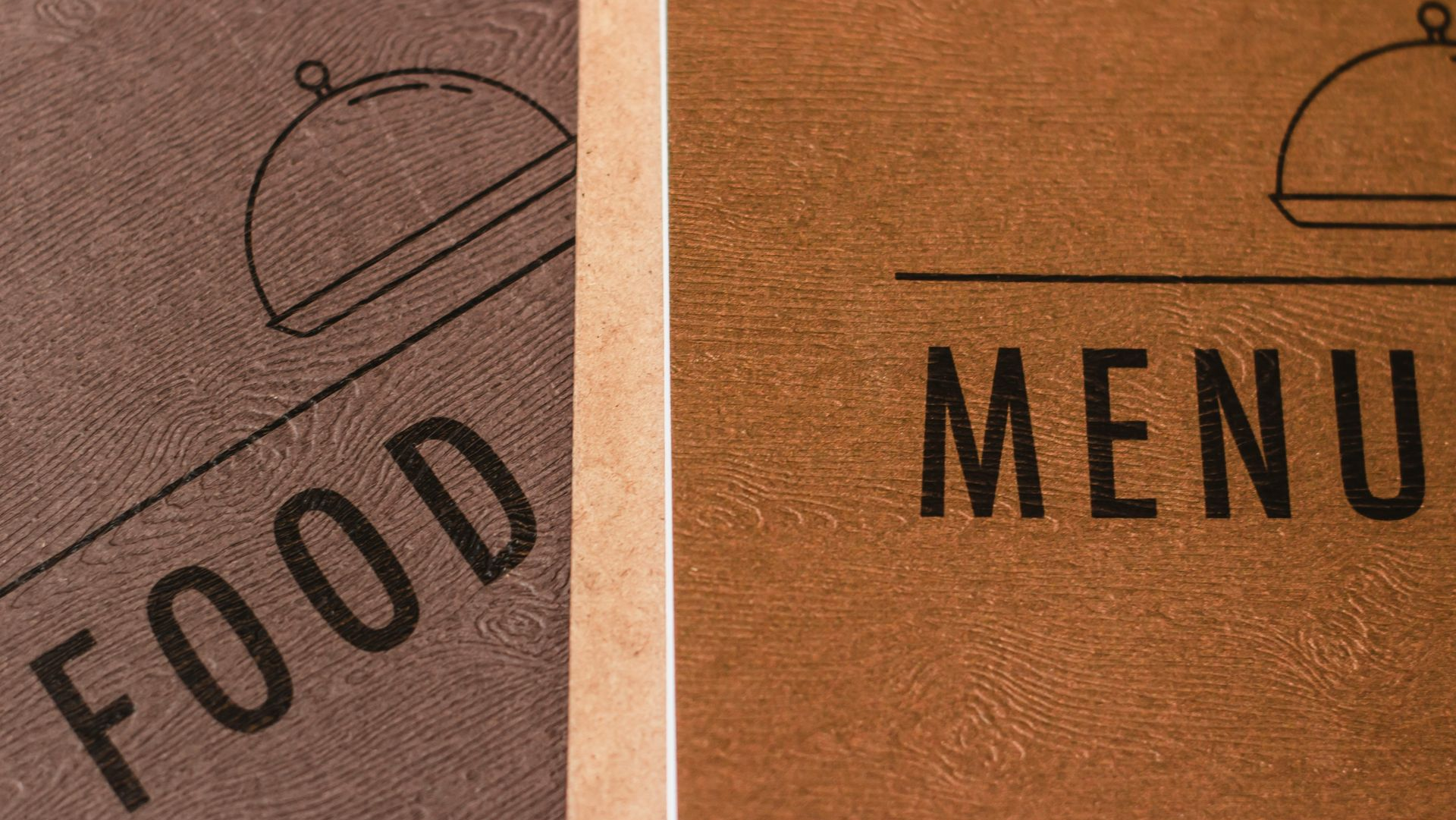 Close-up of a restaurant menu cover: 