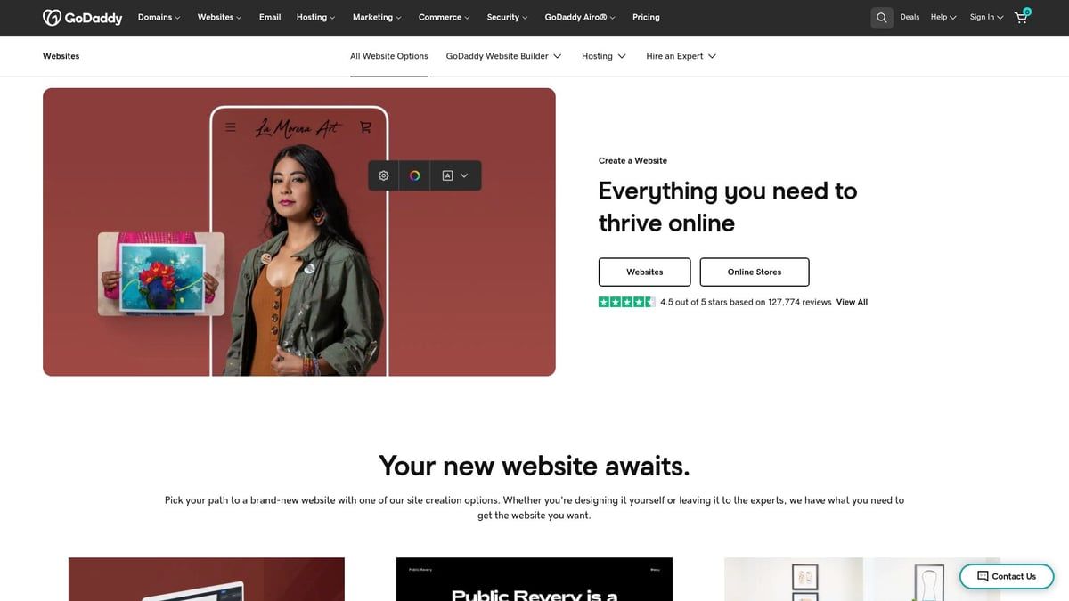 Woman holding a phone displaying a website design, with the headline