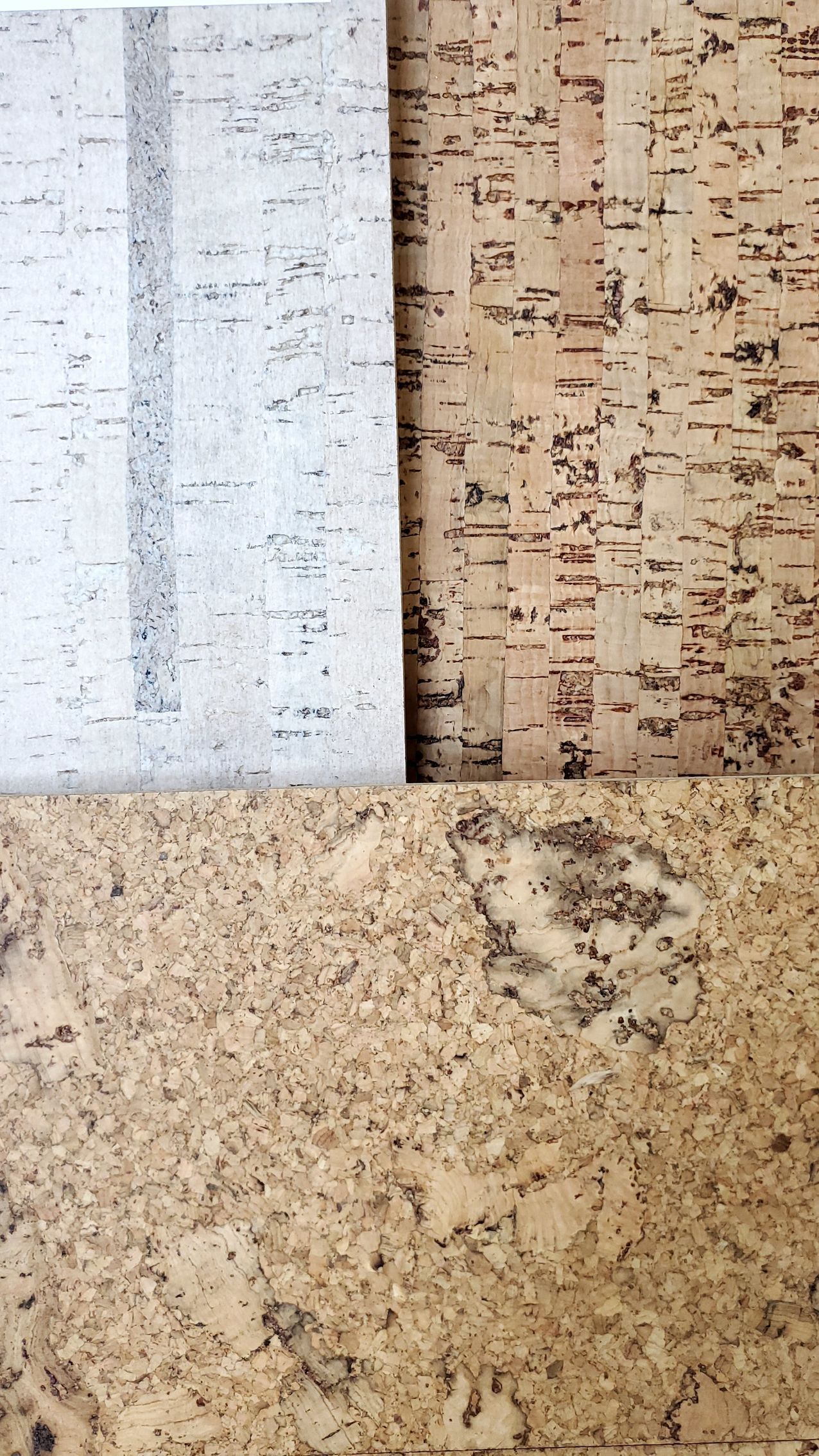 Stack Of Tiles Sitting On Top Of A Wooden Floor — Rochester, MN — Creative Hardwood Floors Inc