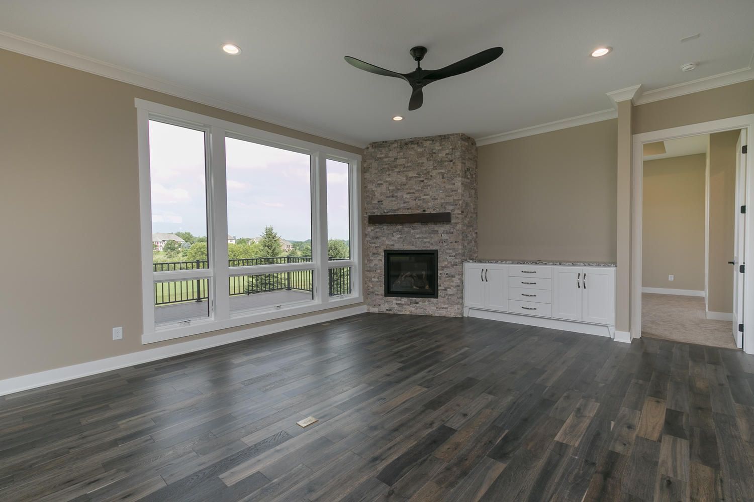 Man Is Sanding A Wooden Floor — Rochester, MN — Creative Hardwood Floors Inc