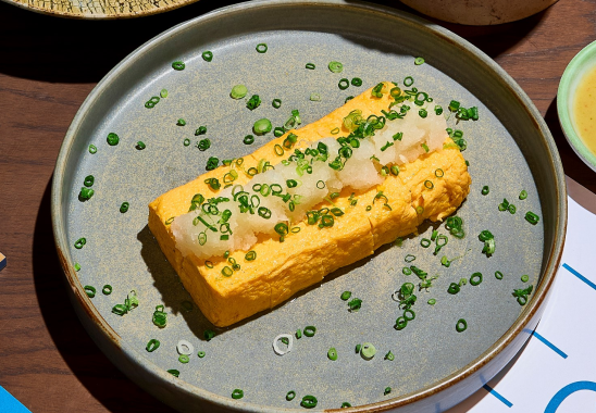 A close up of a plate of food on a table.