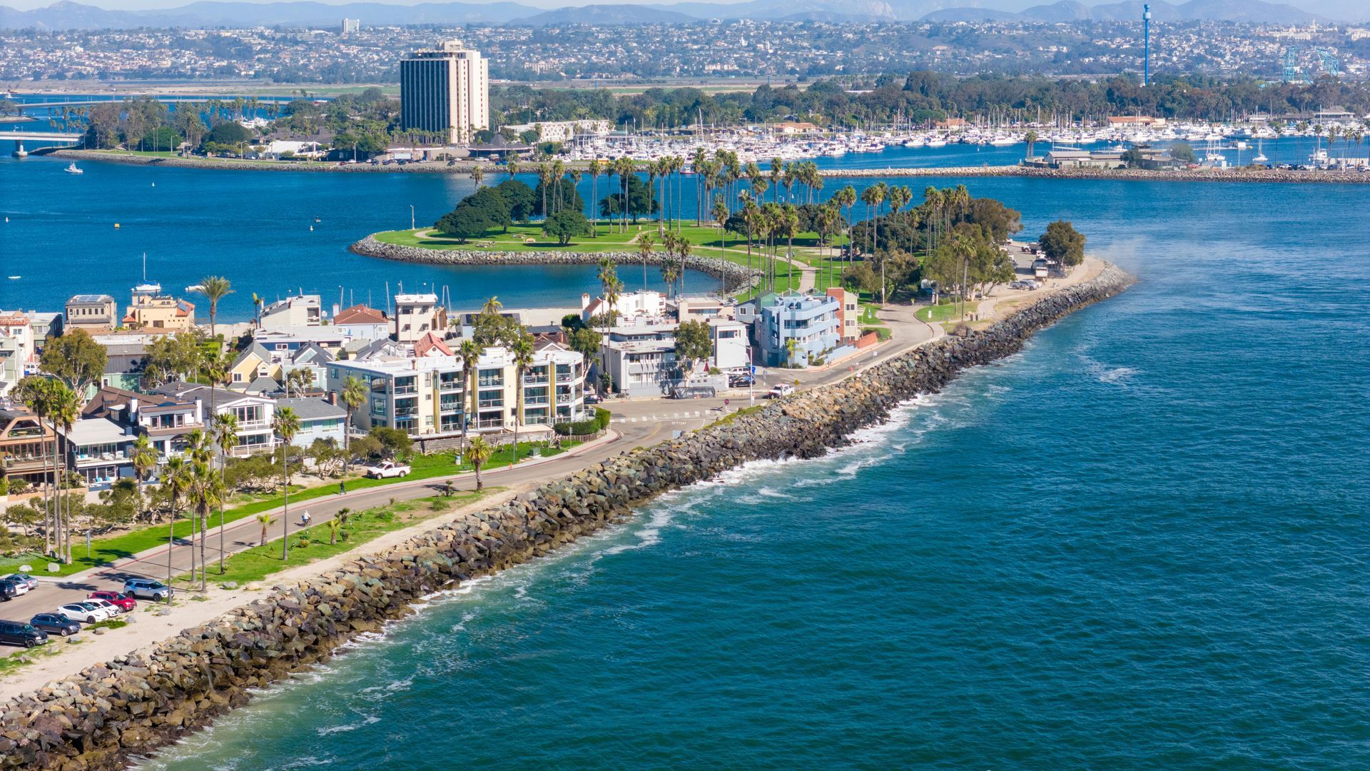 An aerial view of a city next to a body of water.San Diego