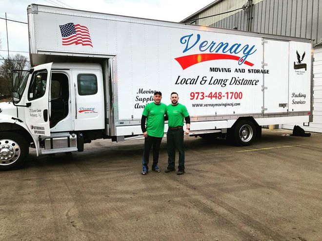 Storage Car — Two Man Wearing Green Shirt with Storage Truck  in Netcong, NJ