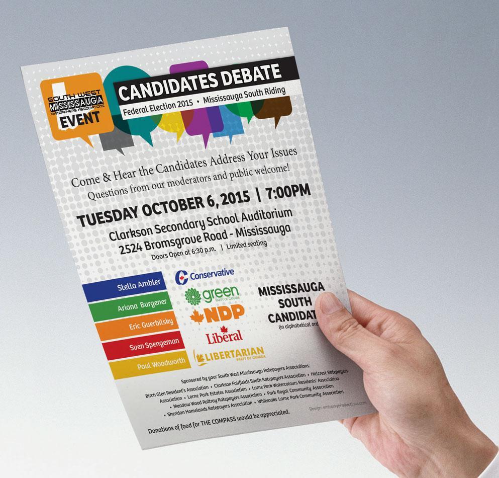A hand is holding a flyer for candidates debate on tuesday october 6 2015