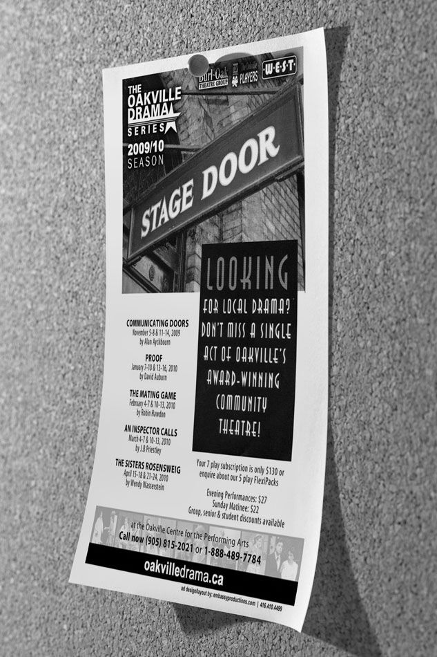 A black and white poster for stage door looking