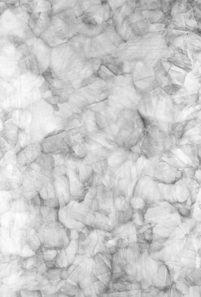 A close up of a white marble texture.