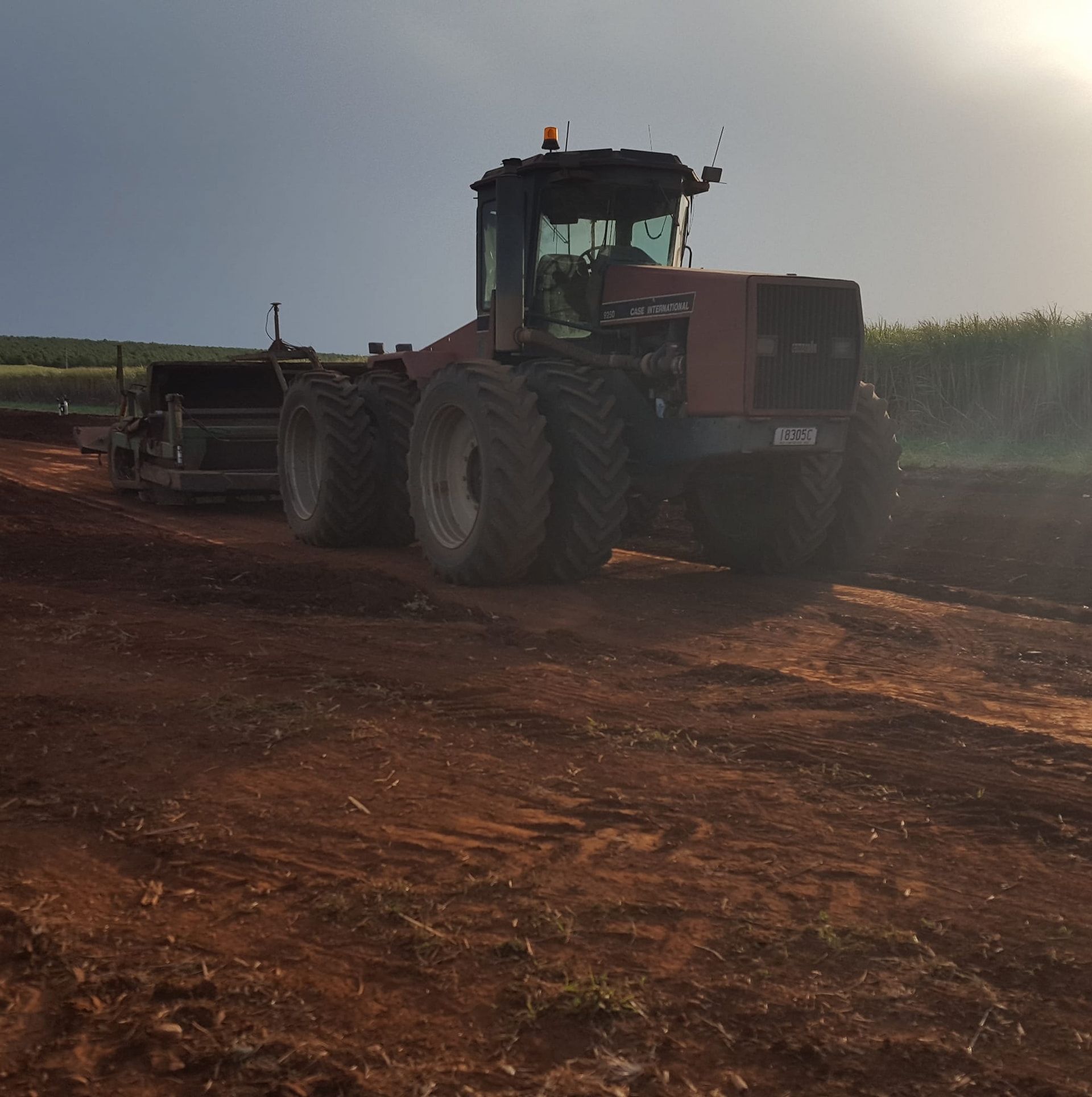 A Tractor With a License Plate That Says a on It — B E Laser Levelling QLD in Bucca, QLD