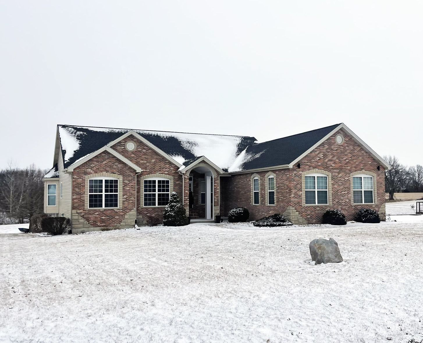 A Custom Home on a Snowy Day. Custom Home Built by Hombs Custom Homes in Mid-Missouri.