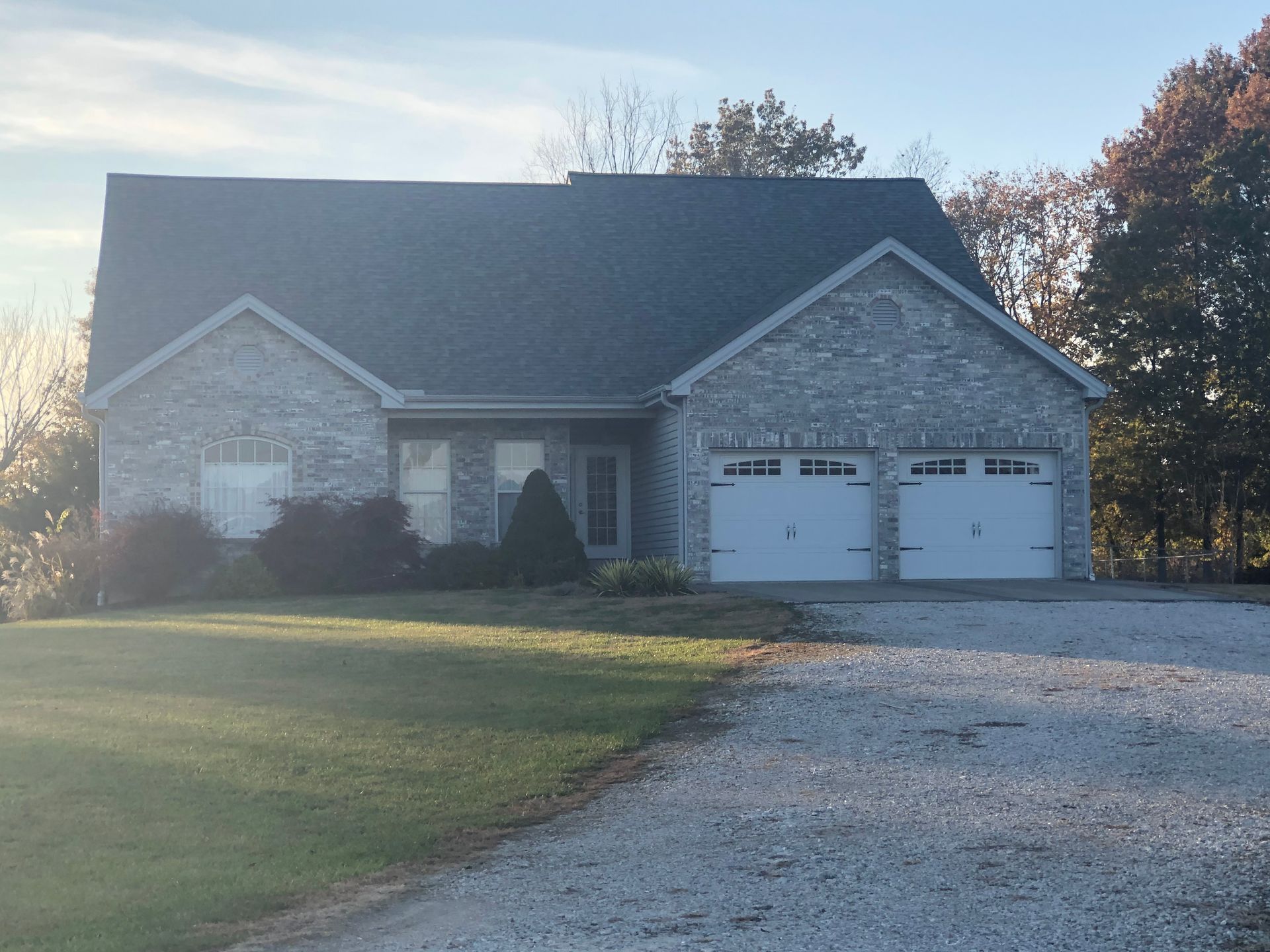 A Custom Built Home Built by a Lake. Call Hombs Custom Homes to Build Your Dream Home in Mid-Mo.