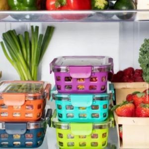 A refrigerator filled with lots of fruits and vegetables.