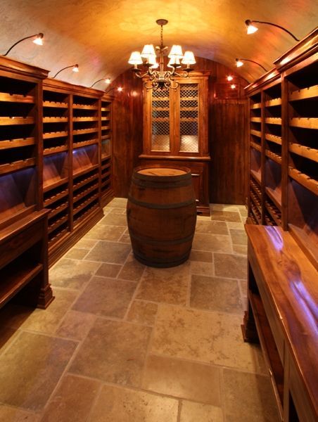 A wine cellar with a barrel in the middle