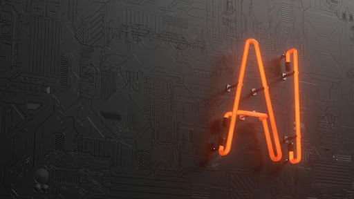 Orange neon AI sign on a dark textured background, resembling a circuit board.