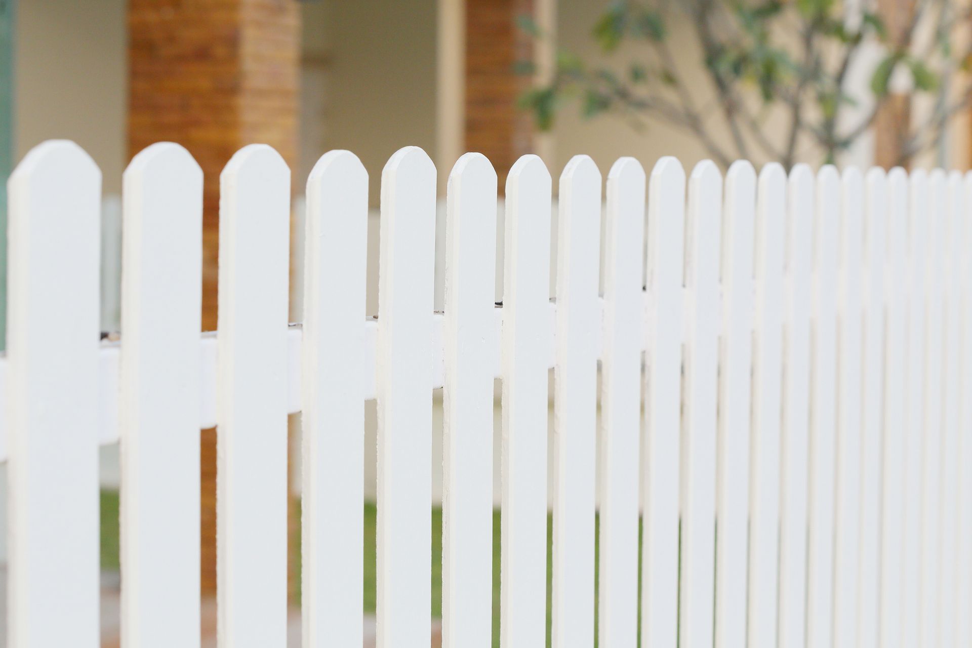 Beautiful white wood fence for a clean, fresh look.