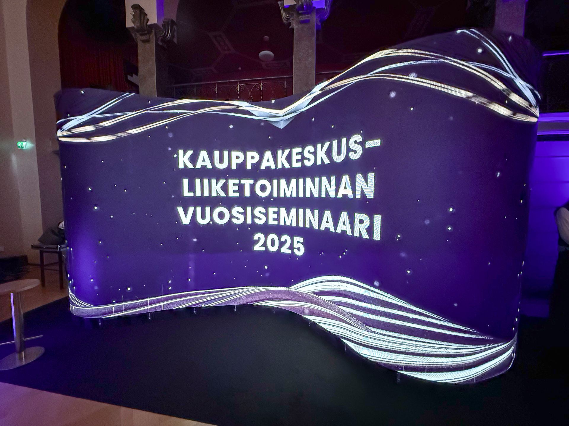 A curved banner displaying 