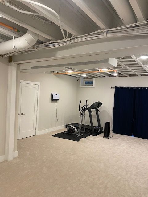 There is a treadmill and an elliptical in the basement.