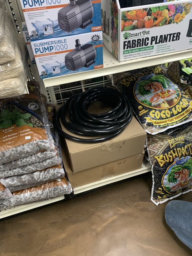 Hoses, Coco for planting soil, water pumps, fabrics planters, and more on the shelf for sale at Growpher