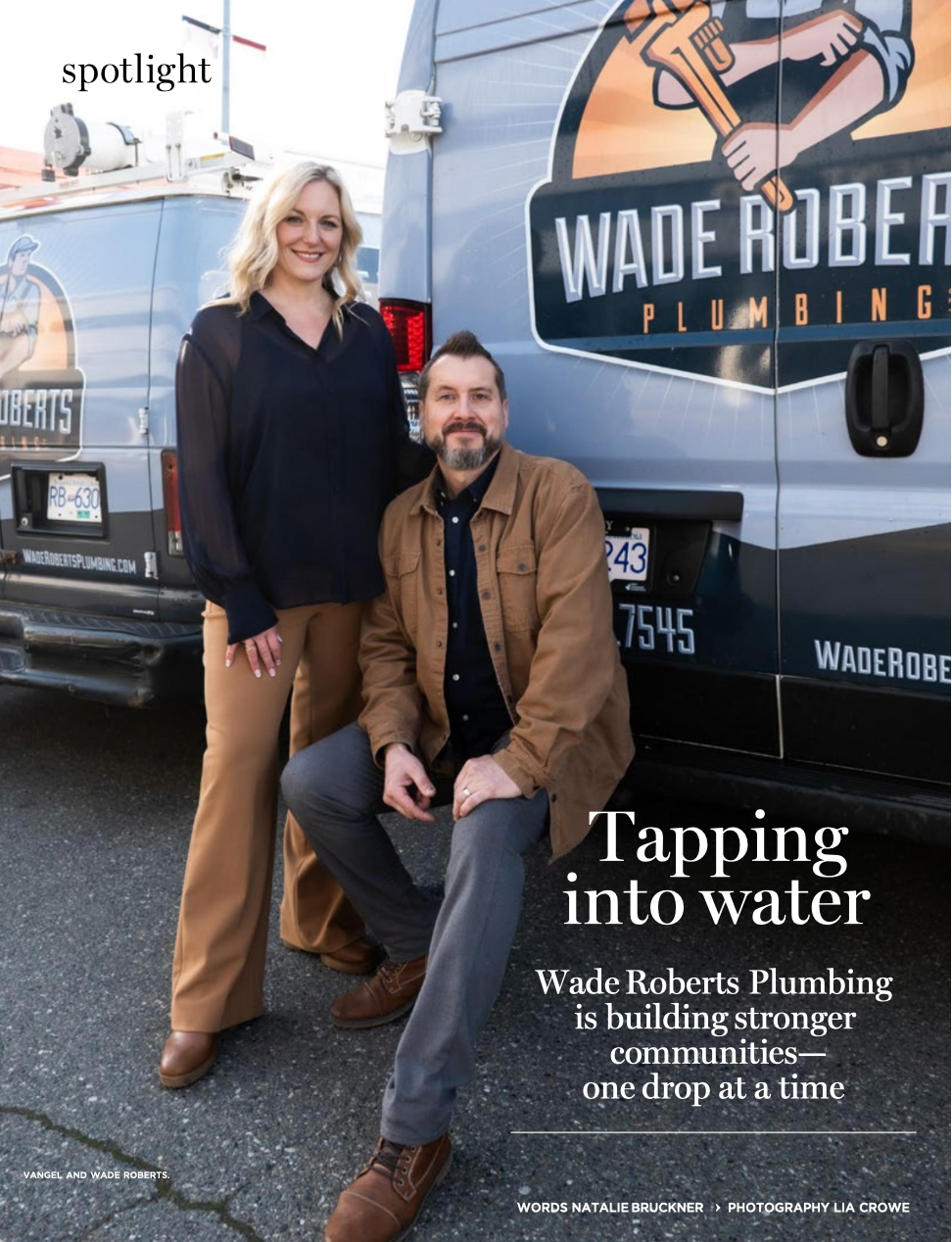 A man and a woman are kneeling in front of a wade roberts plumbing van.