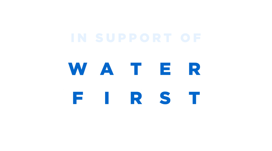 The logo for water first is blue and white and says `` in support of water first ''.