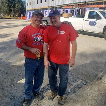 two men with red t-shirt