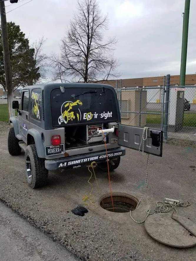 Car And Manhole — Kalispell, MT — A-1 Sanitation