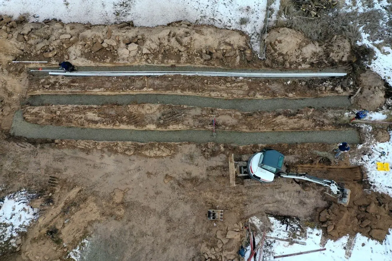 Aerial View Of Backhoe On A Field — Kalispell, MT — A-1 Sanitation