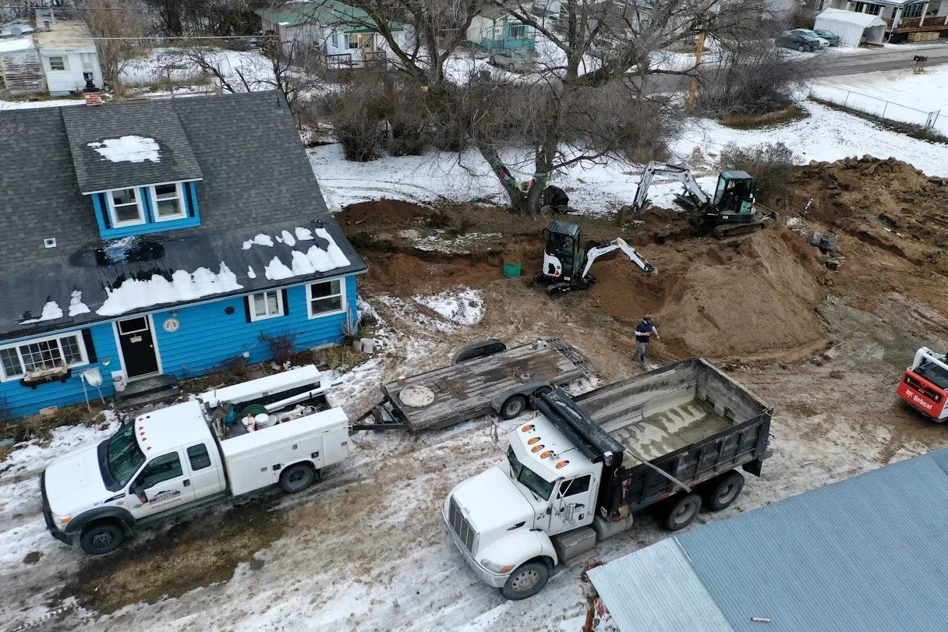 Excavator And Dump Truck — Kalispell, MT — A-1 Sanitation