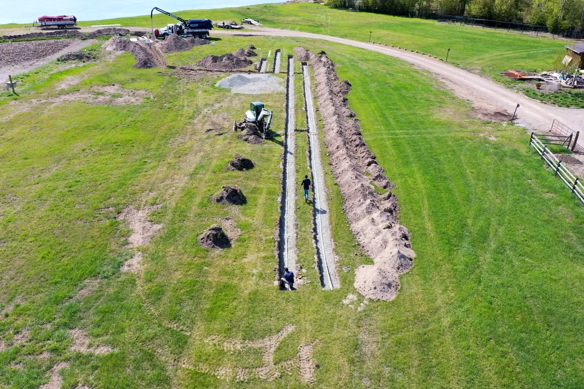 Aerial View Of Workers Installing Pipes — Kalispell, MT — A-1 Sanitation