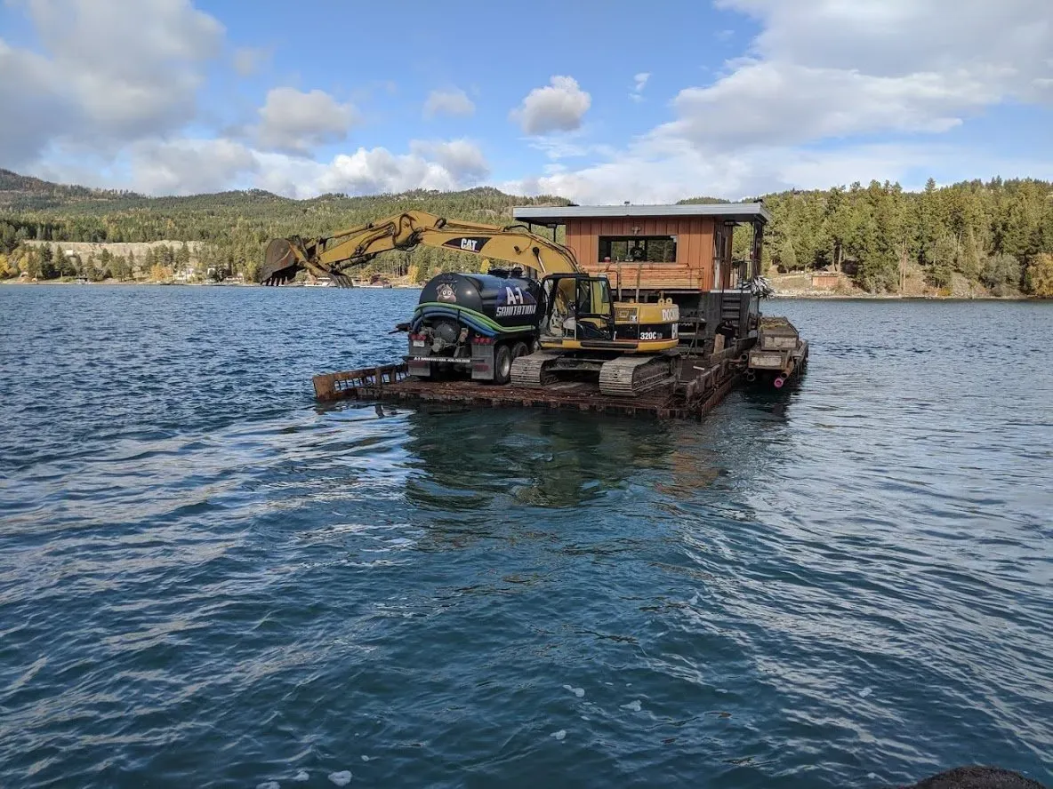Transporting Vehicles In A River — Kalispell, MT — A-1 Sanitation