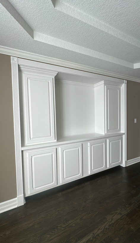 Wooden Dutch door, open screen door, brick exterior. Doorway set in stone wall, doormat, and mailbox.