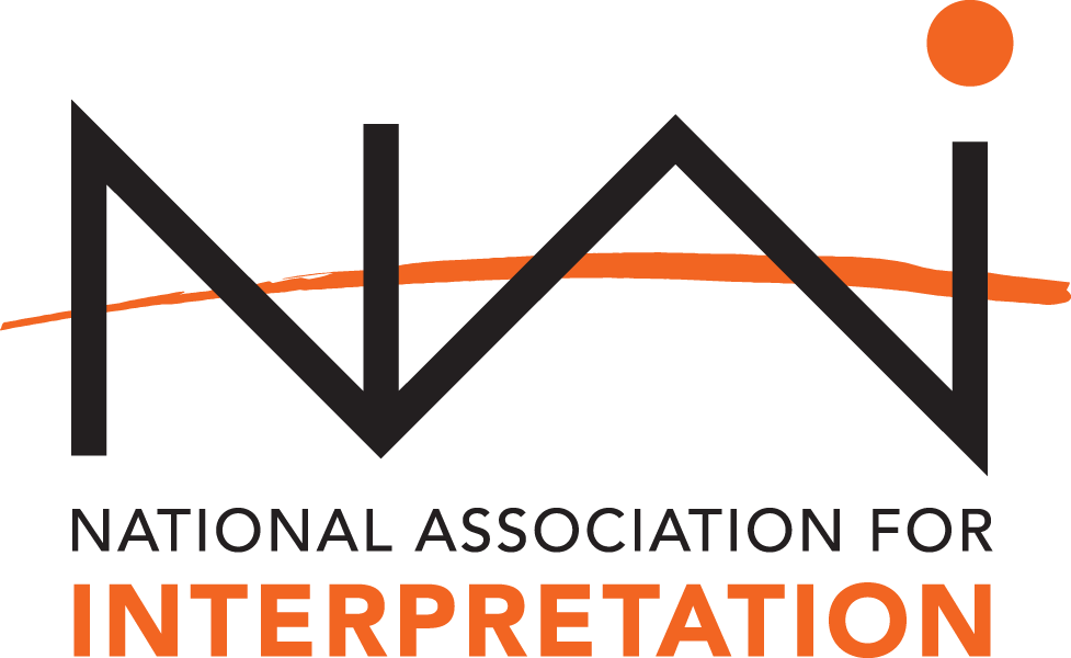 The logo for the national association for interpretation is black and orange.