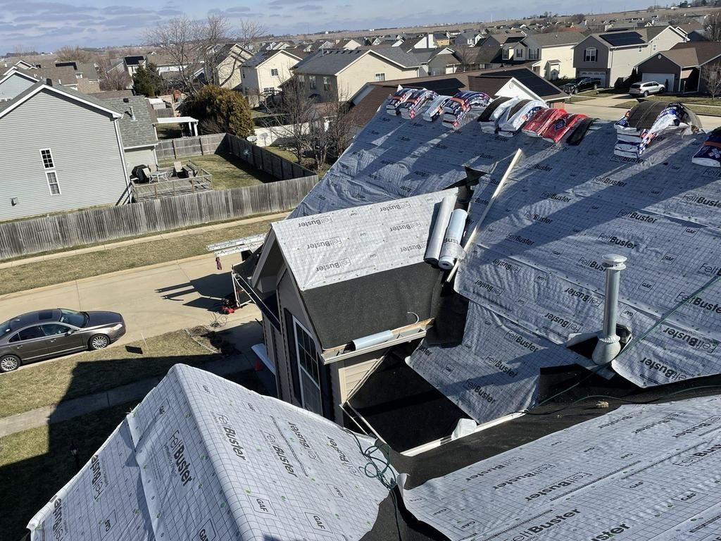 Roof installation by Unity Construction Inc. on a residential home in Champaign, IL.