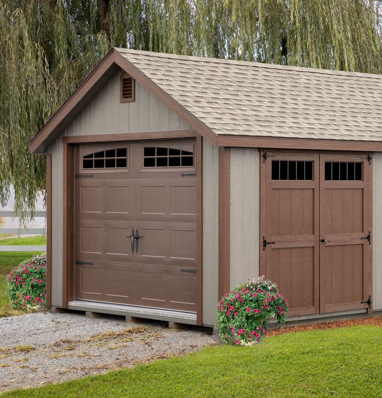 An Amish-built garage with a copper cupola on top of it