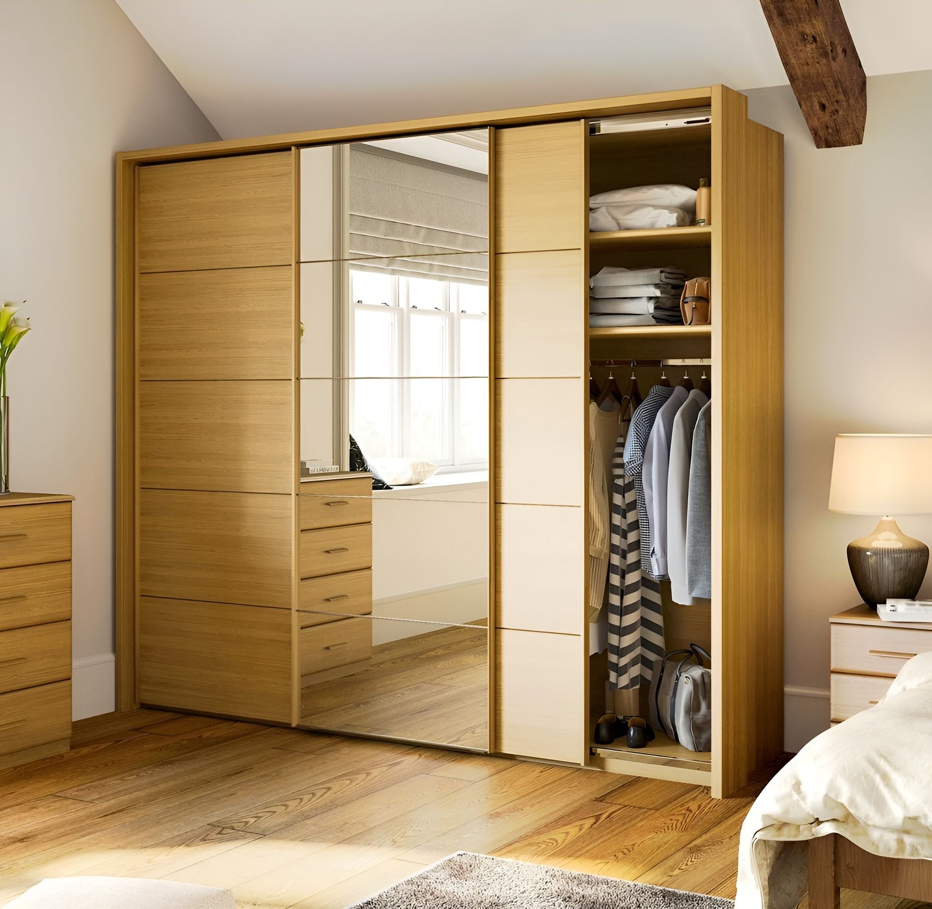 A Bedroom With a Large Sliding Door Wardrobe — Mackay Cabinetmaking Service In Glenella, QLD