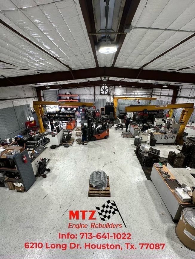 An aerial view of a large warehouse filled with lots of machinery.