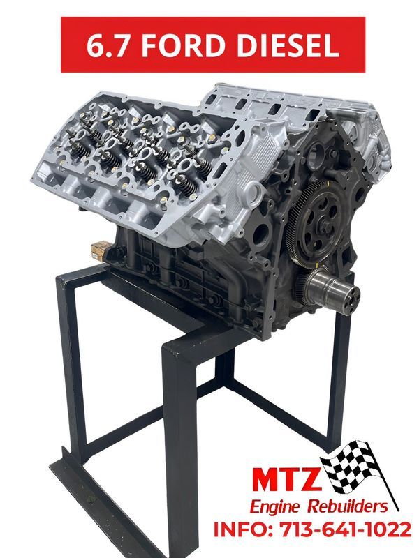 A 6.7 ford diesel engine is sitting on a stand