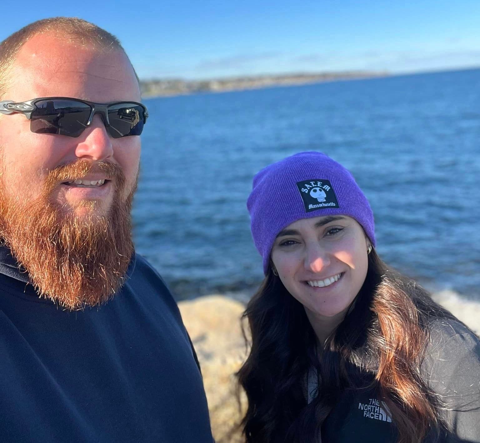 A large house with a lot of windows and a car parked in front of it.