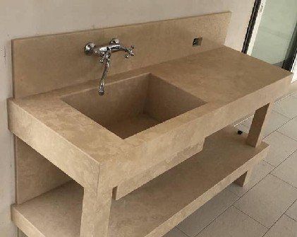 Open cabinet with built-in wash basin in travertine